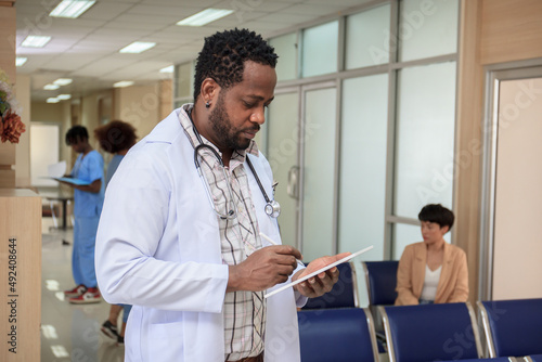 American - African ethnicity doctor working in the hospital in concept of various of ethnicity.