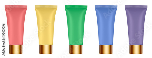 Set of multicolored tubes. 3d mockup. Rainbow palette. Purple, blue, green, yellow and red colors. Hand cream, mask or lotion. Professional shampoo. Gold cap. Plastic bottle.