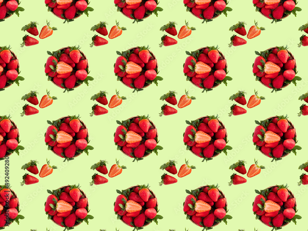 Fresh strawberries pattern with green background