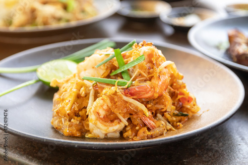 Pad Thai (Stir-fried rice noodles with shrimp) flavor with sugar, lime, ground dried chilies and peanuts; Thailand's popular dishes.