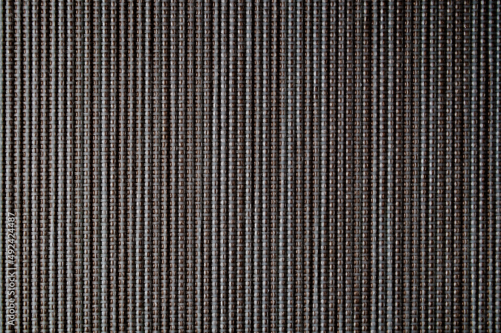 Obraz premium Closeup brown and grey color fabric texture. Fabric pattern design or upholstery abstract background.