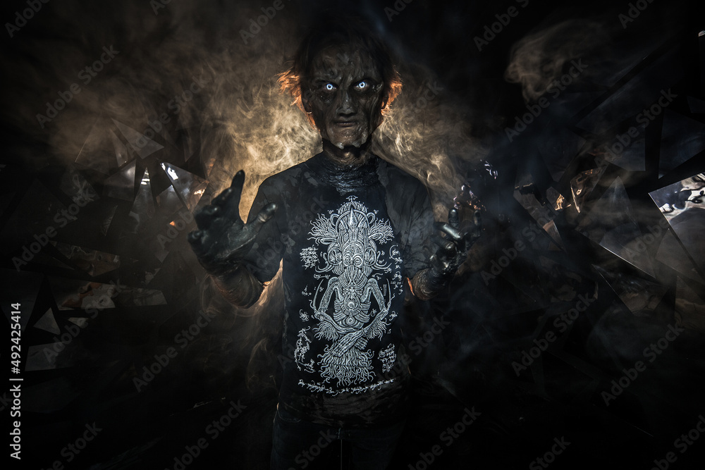 scary sorcerer in smoke. voodoo rite scary sorcerer in smoke. voodoo rite