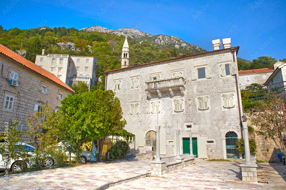 Old historical buildings in sunny day in Perast, Montenegro