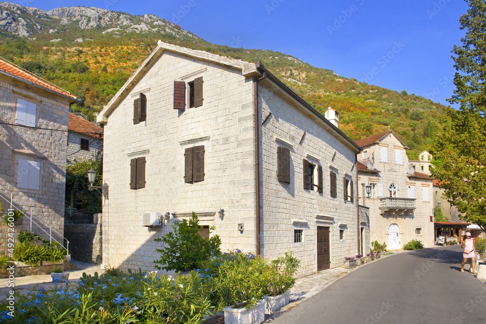 Old historical buildings in sunny day in Perast, Montenegro Old historical buildings in sunny day in Perast, Montenegro