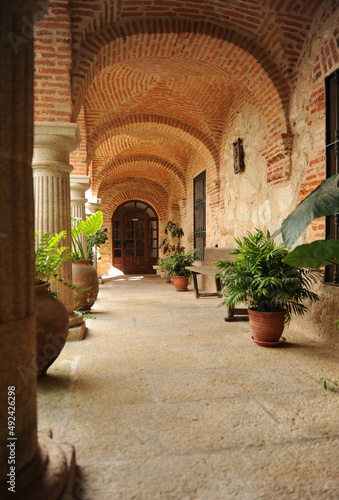 Cloister of the Convent of Our Lady of the Conception of El Palancar, founded by San Pedro de Alcantara. Pedroso de Acim, province of Caceres, Spain photo