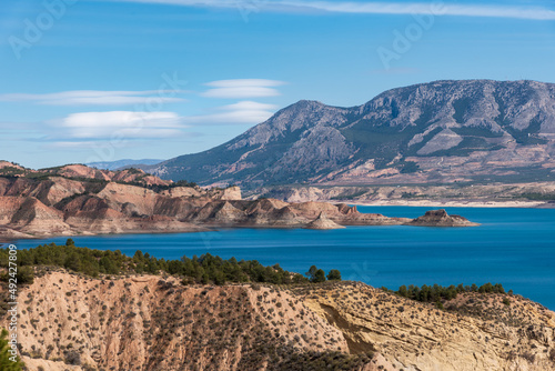 Views of the Negratin reservoir with the surrounding badlands.