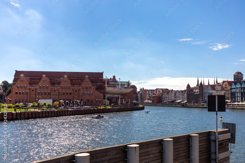 Obraz premium Polish Baltic F. Chopin Philharmonic in Gdańsk is a concert hall located on Olowianka island on the Motlawa river.