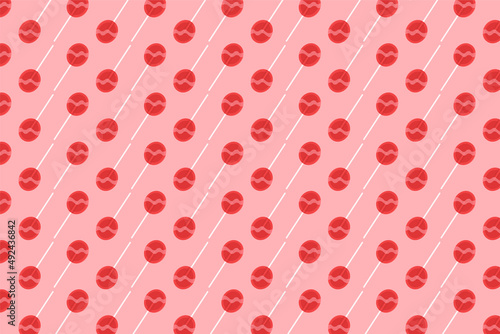 pattern with red lollipops and pink background