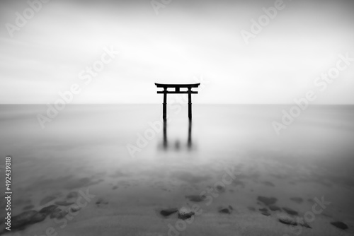 Torii gate at Lake Biwa,  Shiga Prefecture, Japan photo