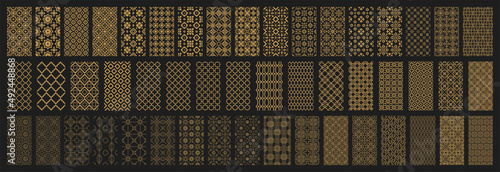Arabic seamless pattern with golden arabic and islamic ornament big set on black background photo