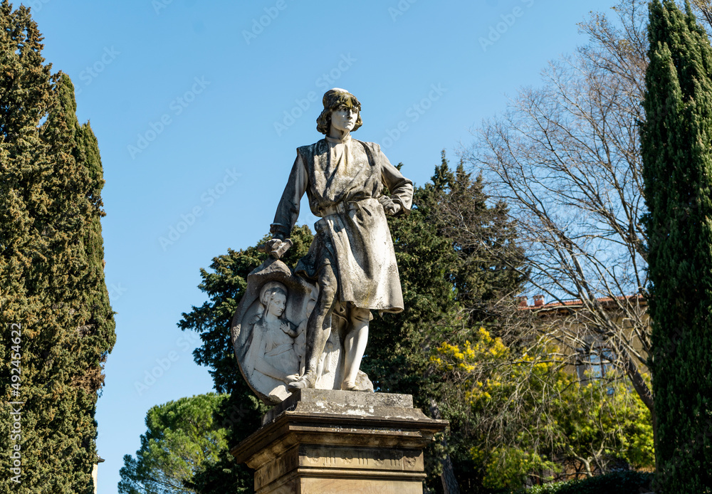 Marble statue of Italian sculptor Desiderio da Settignano erected in 1904 in Settignano, hamlet in the hillside northeast of Florence, metropolitan city of Florence, Tuscany region, Italy.