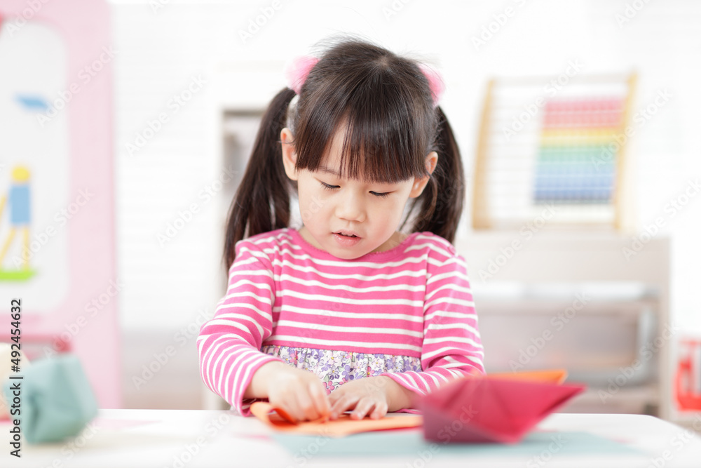 young girl making craft for homeschooling young girl making craft for homeschooling