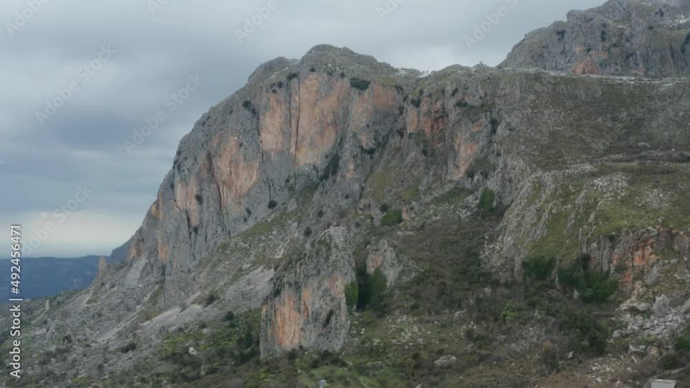 Drone shooting of Rocche del Crasto in winter, a mountainous and rocky complex where the golden eagle nests, Nebrodi, Sicily, Italy. Typical villages set between the fortresses. Longi and Alcara. Drone shooting of Rocche del Crasto in winter, a mountainous and rocky complex where the golden eagle nests, Nebrodi, Sicily, Italy. Typical villages set between the fortresses. Longi and Alcara.