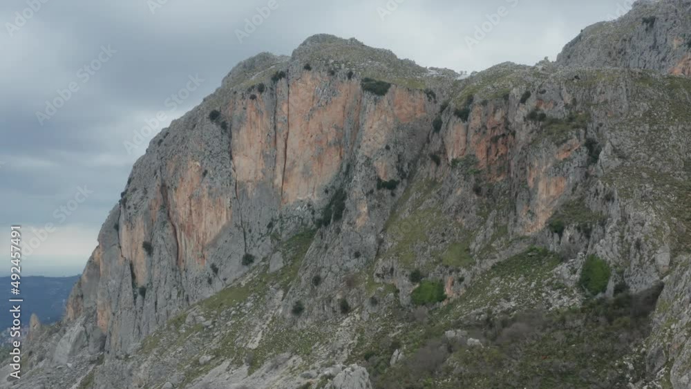 Drone shooting of Rocche del Crasto in winter, a mountainous and rocky complex where the golden eagle nests, Nebrodi, Sicily, Italy. Typical villages set between the fortresses. Longi and Alcara. Drone shooting of Rocche del Crasto in winter, a mountainous and rocky complex where the golden eagle nests, Nebrodi, Sicily, Italy. Typical villages set between the fortresses. Longi and Alcara.