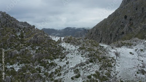 Wallpaper Mural Drone shooting of Rocche del Crasto in winter, a mountainous and rocky complex where the golden eagle nests, Nebrodi, Sicily, Italy. Typical villages set between the fortresses. Longi and Alcara. Torontodigital.ca