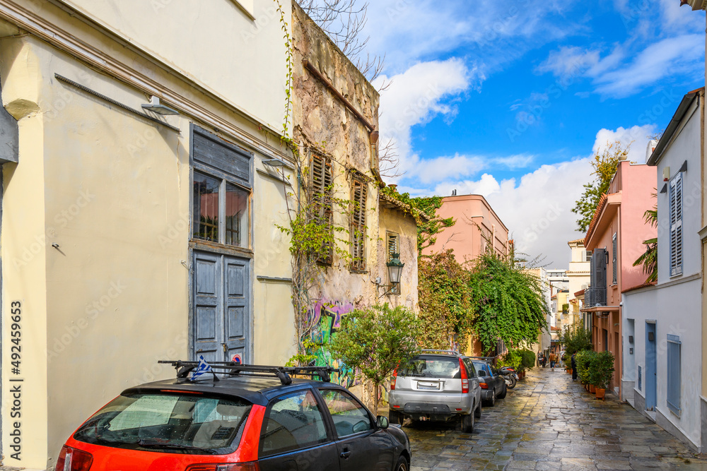Morning after a rainstorm on a colorful, wet, street in the Plaka district of Athens, Greece.