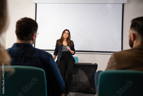 Businesswoman holding presentation speach