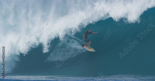 Canvas Print Surfer surfing big ocean barrel tube wave at Pipeline in north shore of Hawaii's