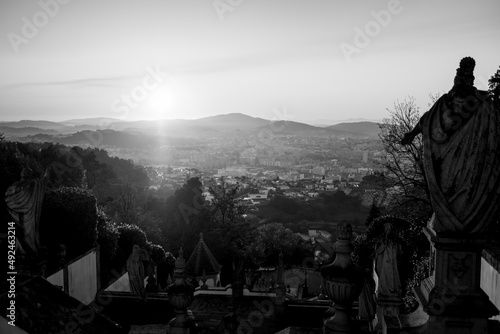 View of the stairway to the church of Bom Jesus do Monte in evening, Braga, Portugal. Black and white photo.
