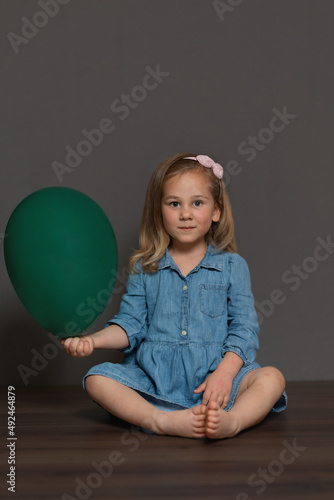A girl with a balloon