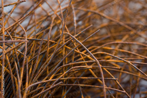 armature rusty rods for building a house in a house under construction