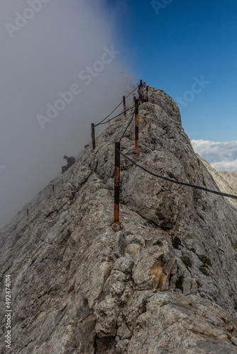 Koncheto ridge in Pirin mountains with fog at a side, Bulgaria photo