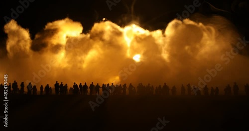 Creative artwork decoration - Russian war in Ukraine concept. Crowd looking on giant explosion and attacking soldiers. Selective focus