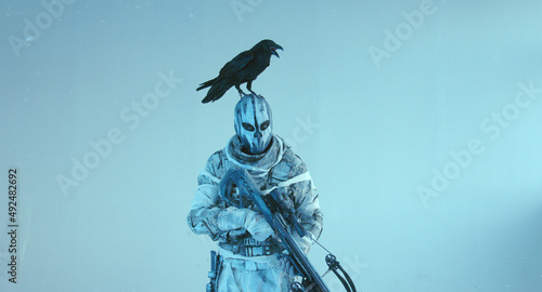 fighter with a crossbow and a raven  Apocalypse 