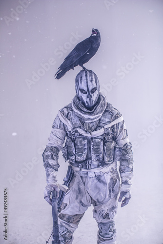Canvas Print fighter with a crossbow and a raven