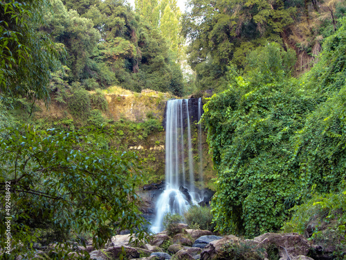 waterfall of da  icalqui estuary in the region of   uble  Chile   this waterfall is in a forest and to get to it you have to drive along a forest road and then walk through a small fores