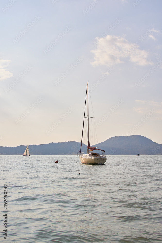 Sailboat preparing to sail on the lake