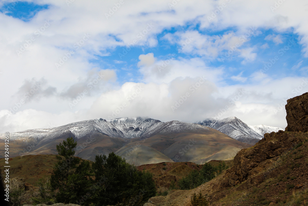 mountain landscape. View of snow-capped mountain peaks, Gorny Altai, on the border with Mongolia