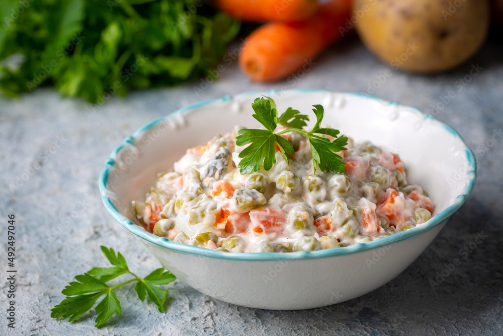 Russian salad Olivier with mayonnaise and egg served (Turkish name; Rus salatasi)