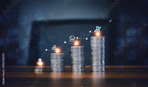 Fotografía Digital chart stock market on coins stack for investment or trading concept