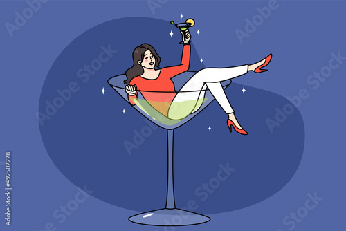 Overjoyed young woman lying in martini glass having fun drinking alcohol. Concept of bad habit or addiction. Happy girl addicted to alcoholic beverages. Alcoholism problem. Vector illustration. 