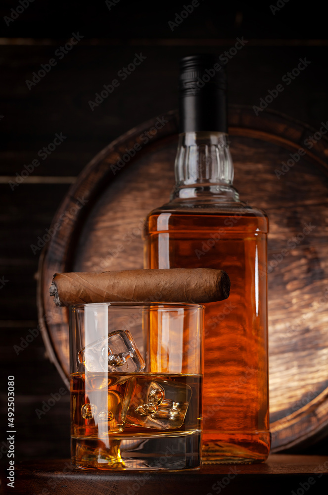 Glass and bottle with cognac