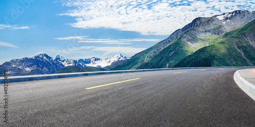 Wallpaper Mural Asphalt road and mountain with beautiful sky clouds under blue sky Torontodigital.ca