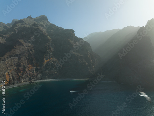 Los Gigantes steep huge cliffs rock wall bordering the blue atlantic ocean panorama seascape.Tenerife, Spain, Canary islands, europe.