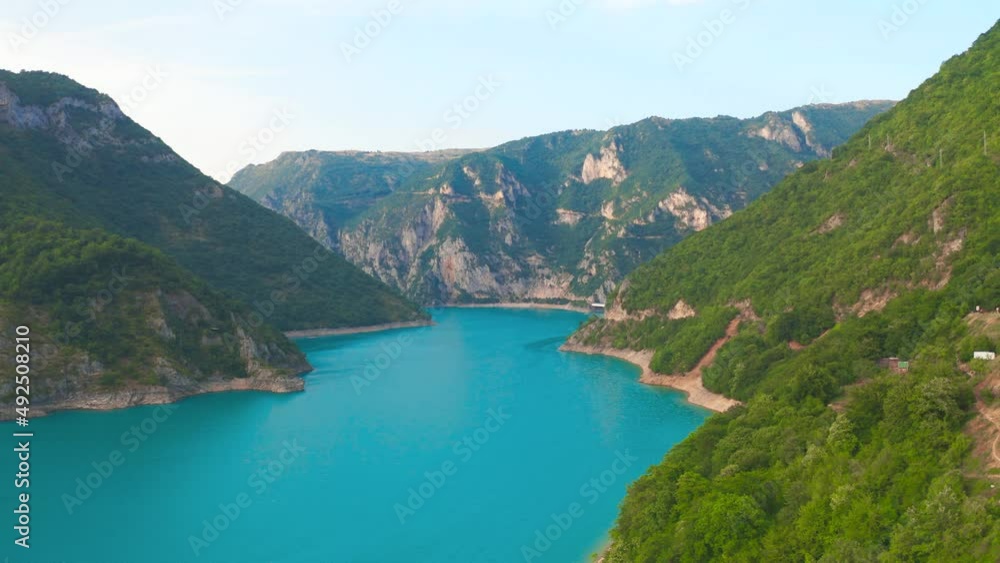 Aerial view of lake Piva with turquoise water on rocky canyon in Montenegro Aerial view of lake Piva with turquoise water on rocky canyon in Montenegro
