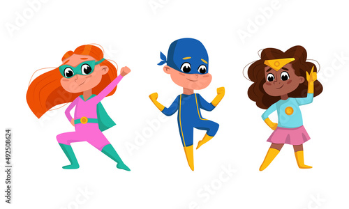 Brave kids superheroes set. Cute joyful boy and girl wearing colorful comics costumes cartoon vector illustration