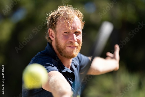 Amateur playing tennis in Melbourne, Australia  © William