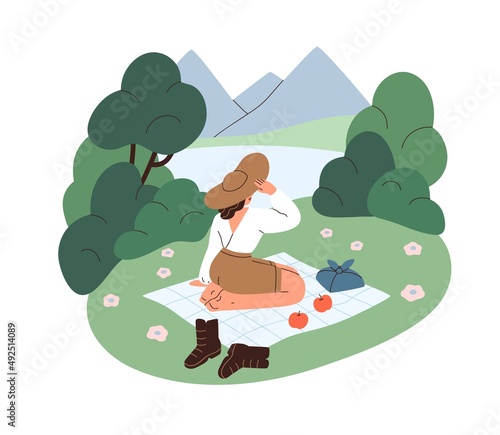 Woman relaxing in nature alone, watching summer view with mountains, lake. Si...