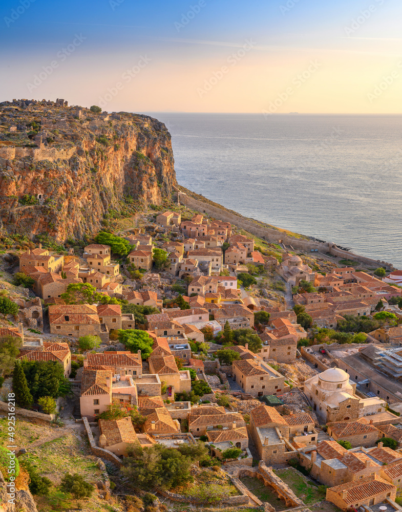picturesque parorama old medieval castle town of Monemvasia in Lakonia at sunrise, Peloponnese, Greece.