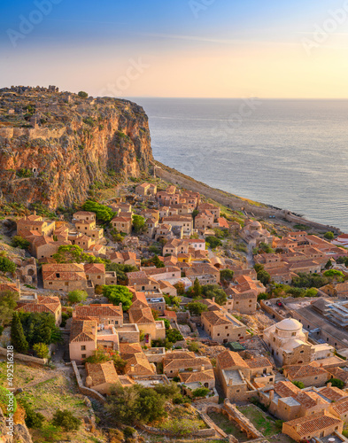 Obraz na płótnie picturesque parorama old medieval castle town of Monemvasia in Lakonia at sunrise, Peloponnese, Greece.