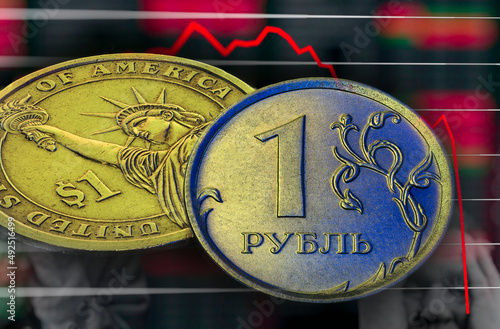 Russian Ruble Coins on US Dollar falling Stack. Ukrainian flag colors illuminating. Ukraine war sanctions exchange rate ruble fall concept. Macro