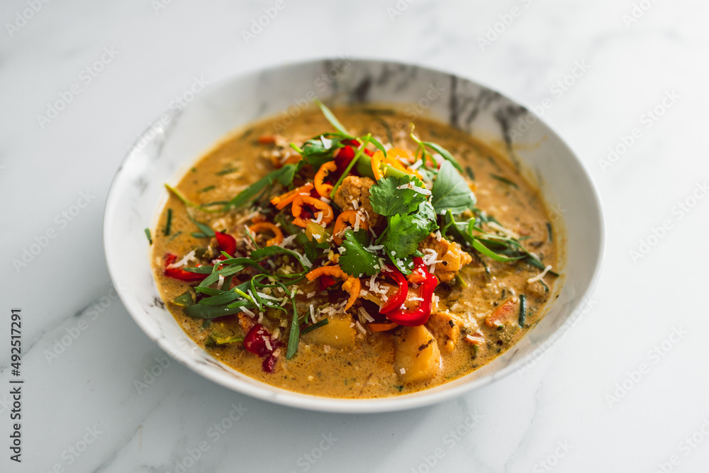 vegan thai vegetable curry with fresh chili and herbs, healthy plant-based food vegan thai vegetable curry with fresh chili and herbs, healthy plant-based food