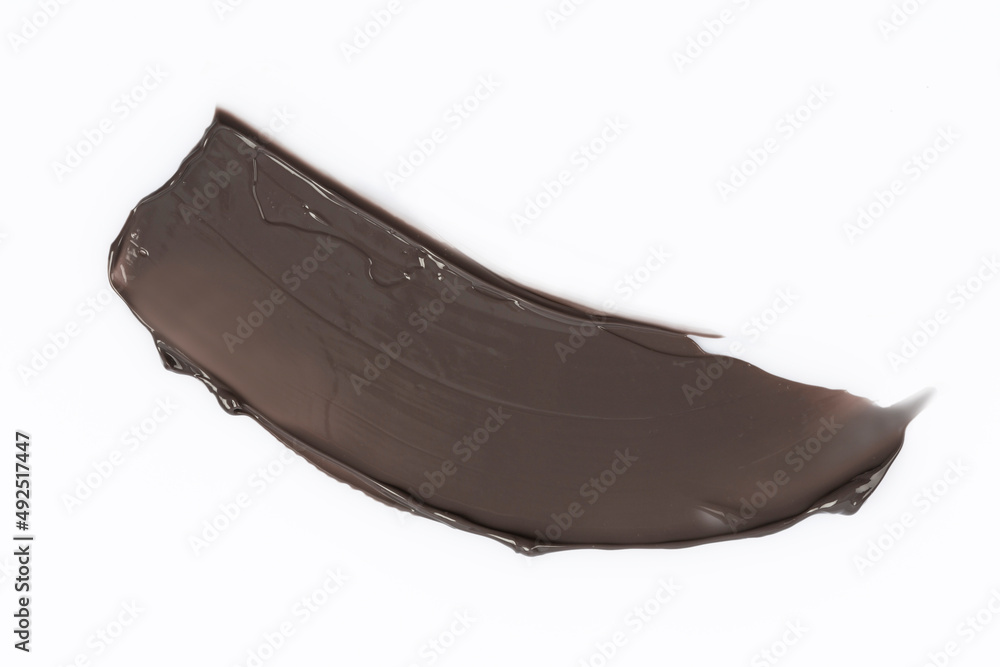 Fototapeta premium on a white background smeared with colored cream