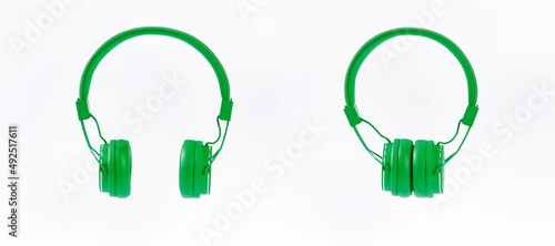 green headphones on a white background