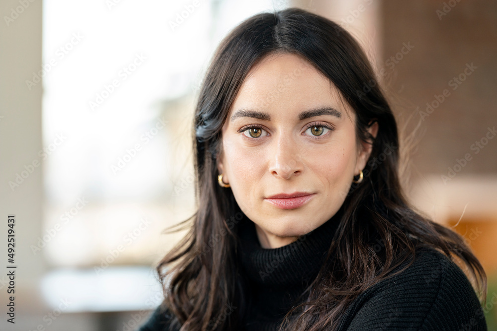 Confident woman with brown eyes Confident woman with brown eyes