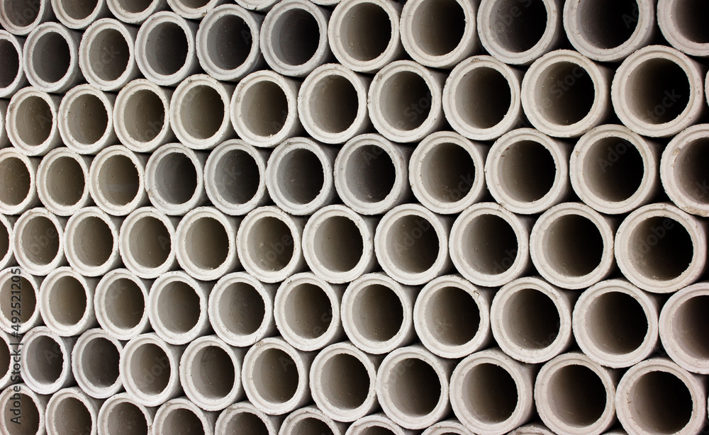 stacking, pattern background. Asbestos pipes for irrigation. stacking, pattern background. Asbestos pipes for irrigation.